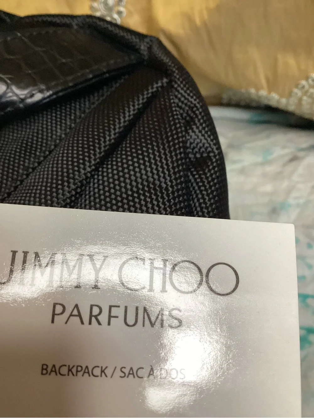 Jimmy Choo Parfum Black Backpack with Front Zip Pocket